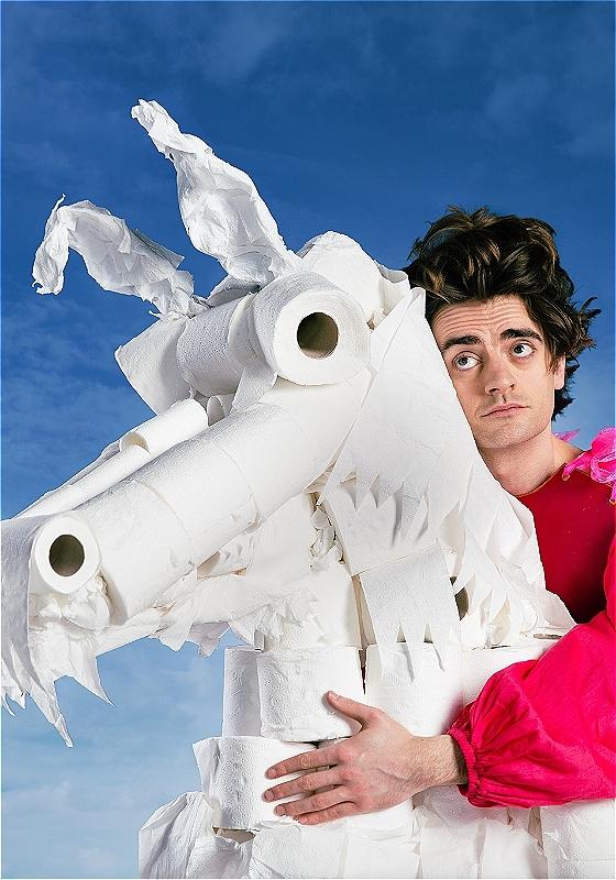 The performer wistfully clutches a horse made out of toilet roll.  