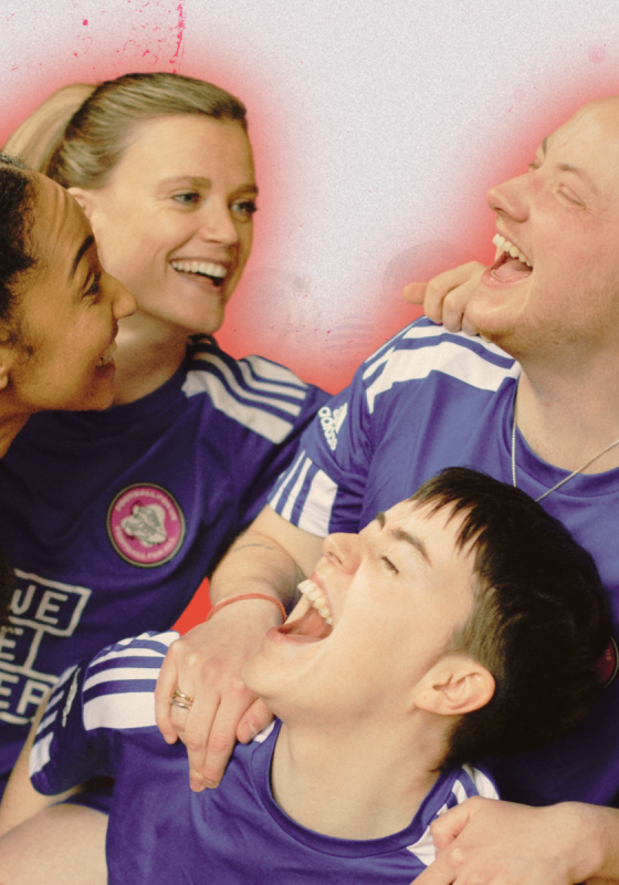 4 performers wearing football shirts and laughing