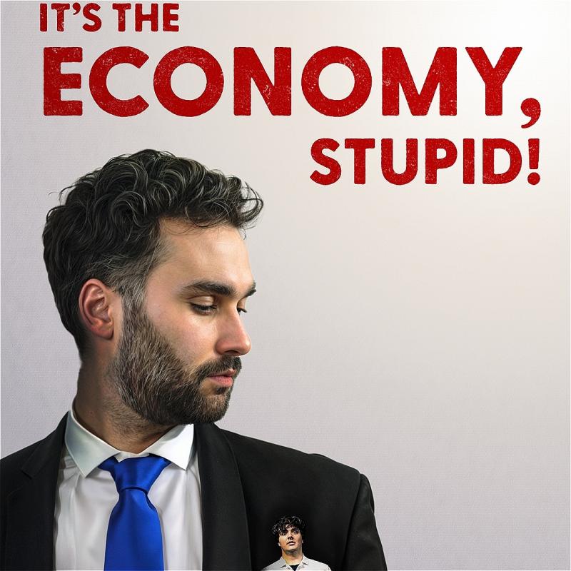 A performer wears a black suit and blue tie. A picture of a person is coming out their front pocket. The show title is in red - 'It's the Economy, Stupid!'