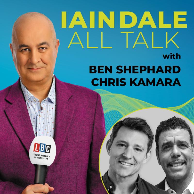 In front of a blue background, Iain Dale wears a purple suit and looks into the camera, holding a mic. Black and white headshot of Ben Shephard and Chris Kamara in bottom right.